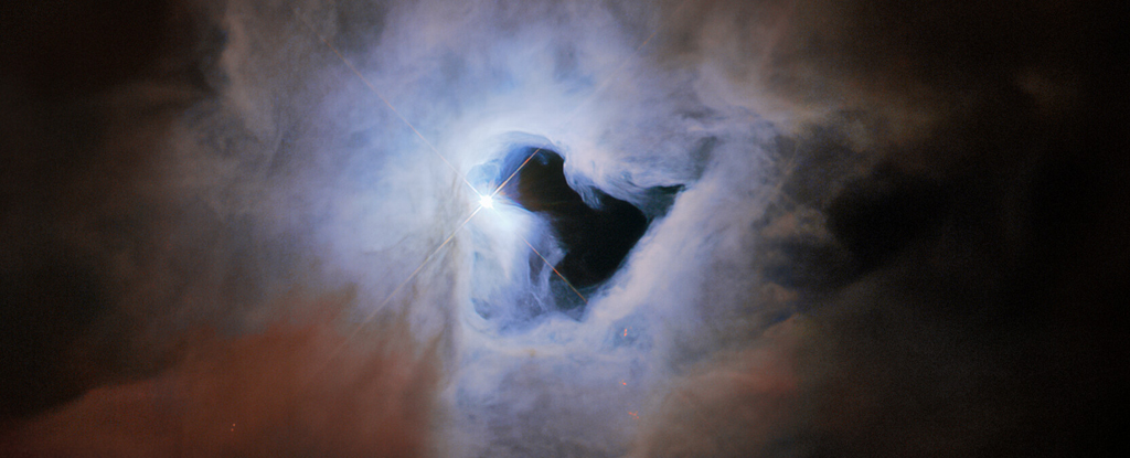 Il telescopio Hubble ha trovato un "buco della serratura cosmico" nel profondo dello spazio e siamo sbalorditi: ScienceAlert