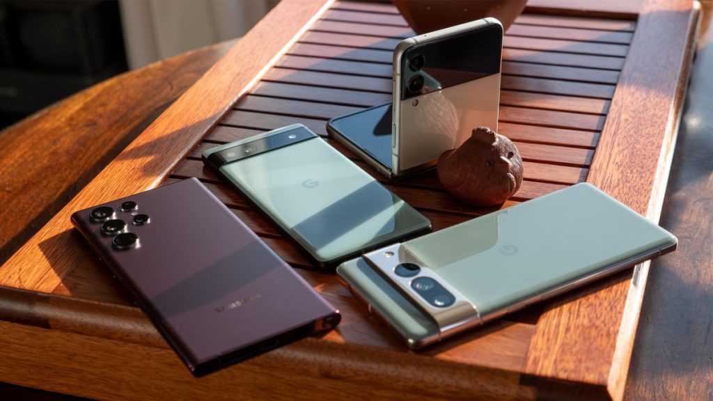 The Samsung Galaxy S22 Ultra and Z Flip 4 alongside the Google Pixel 6a and 7 Pro on a tea tray