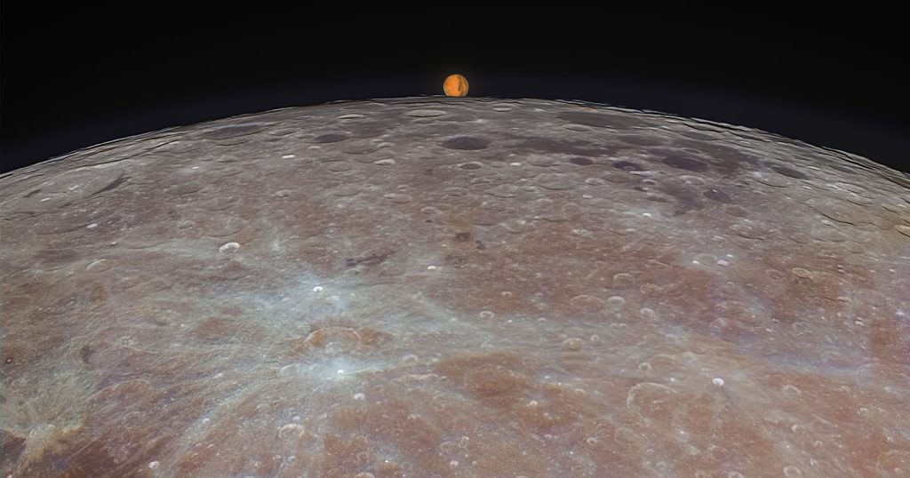 Un fotografo che cattura un momento magico da Marte emerge da dietro la luna